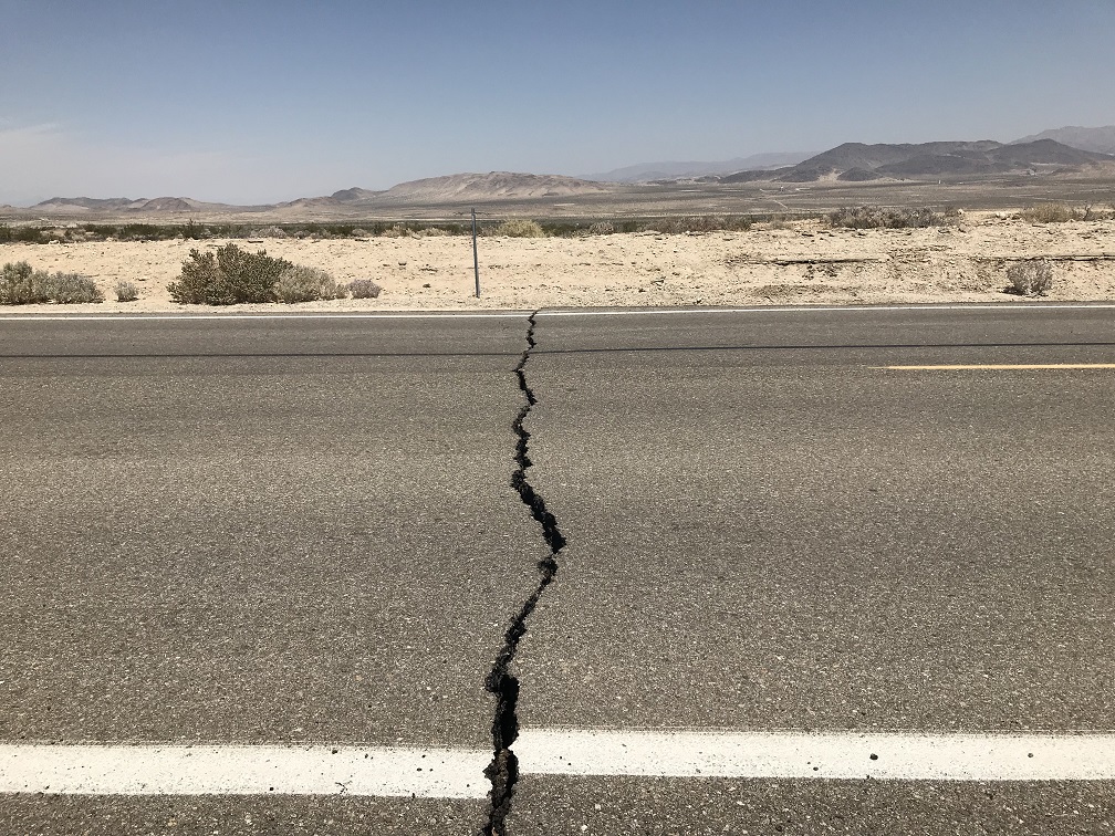 Ground movement caused a crack and offset the painted lines on Highway 178 near Ridgecrest.