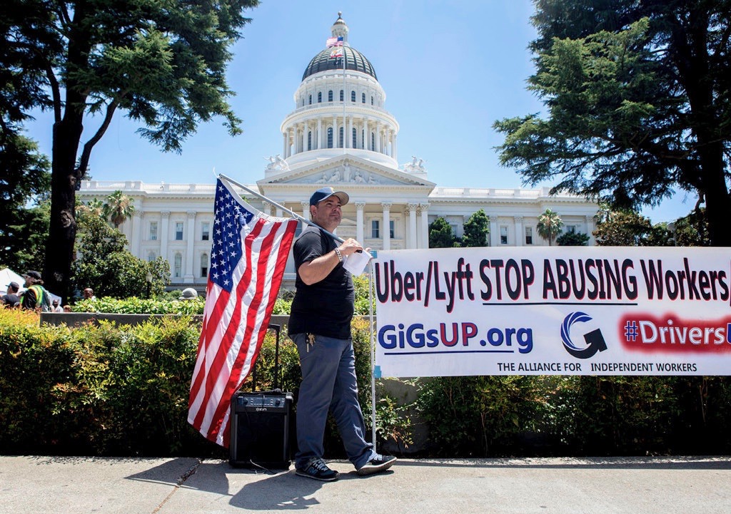 Uber driver Luke Rivera rallies in support of AB 5 in July.