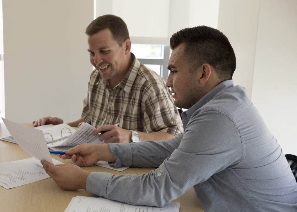 Ivan Hernandez (right), pictured in 2016, is a first-generation college graduate who's now pursuing a Ph.D. in psychology after working in the lab of psychology professor Wesley Schultz at Cal State San Marcos.