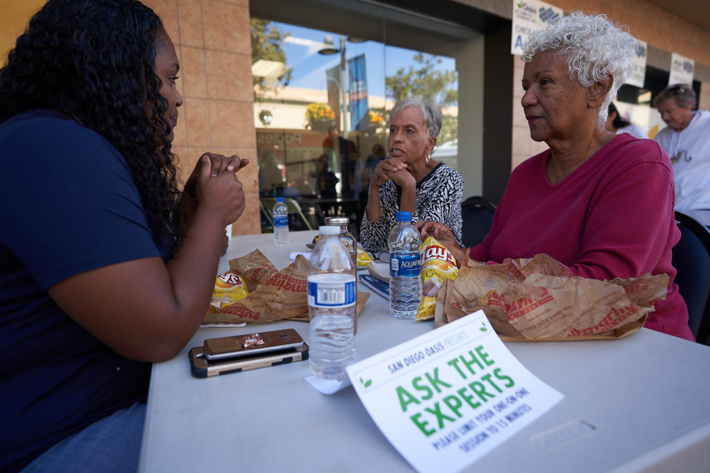 Attendees of the ‘Get Connected: Technology Fair for 50+’ receive one-on-one advice from a tech expert. Admission is free. (Photo courtesy of San Diego Oasis) 