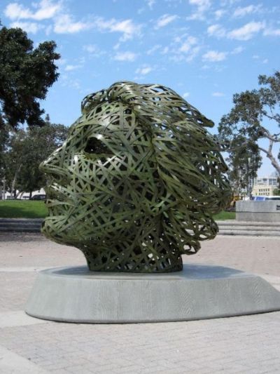 Penelope’ is constructed of welded silicon bronze strips that have been woven into the form of a large-scale women's head. Created by artist Michael Stutz, the sculpture is located in Coronado Tidelands Park.