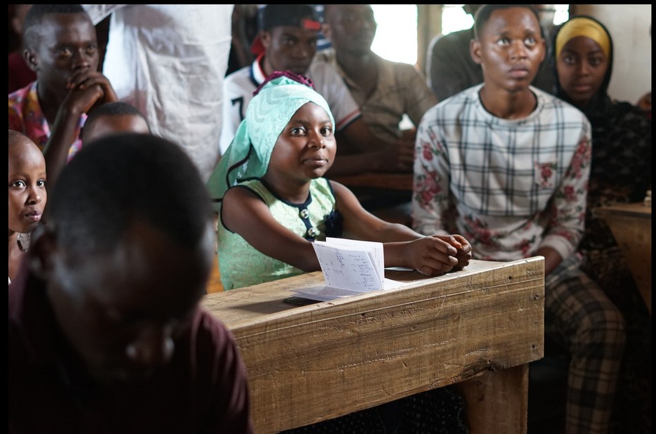 Burundian girl sitting in BFI English Club. (Photo courtesy of Burundi Friends International)