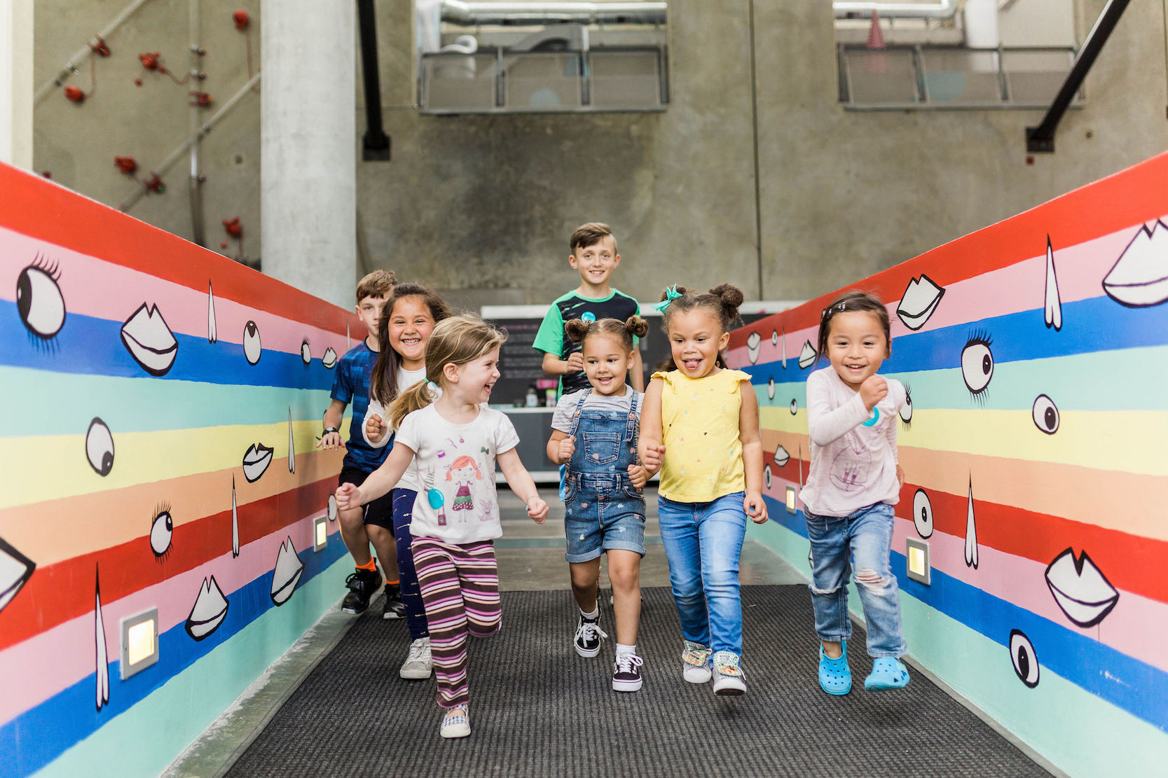 Smiling children having fun at The New Children’s Museum. (Photo by Dani Toscano)