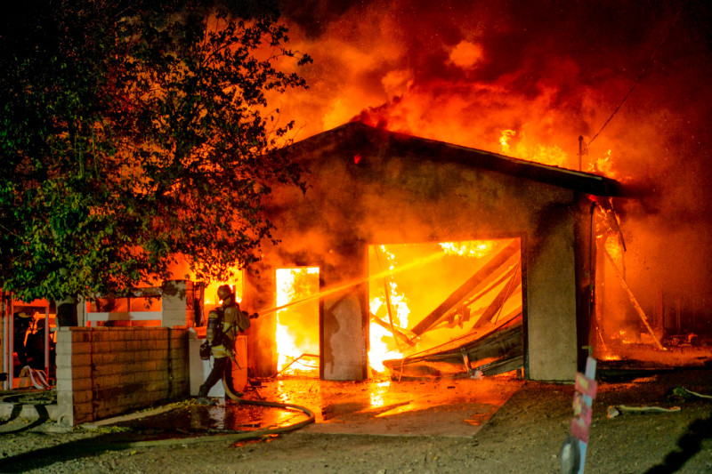 A hinge burns on Baker Canyon at Husk Ave from the Tick Fire in Canyon Country, Oct. 24, 2019. (Photo by Hans Gutknecht, Los Angeles Daily News/SCNG)