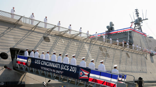 The crew of the USS Cincinnati “man the ship” during the commissioning ceremony in Gulfport, MS. (Navy photo)