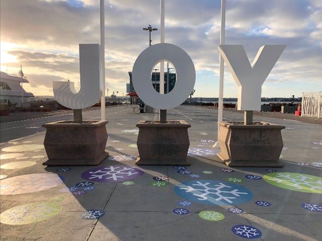 Three oversized, sculptural letters spelling the word “JOY” will be installed at the entrance of the pier.