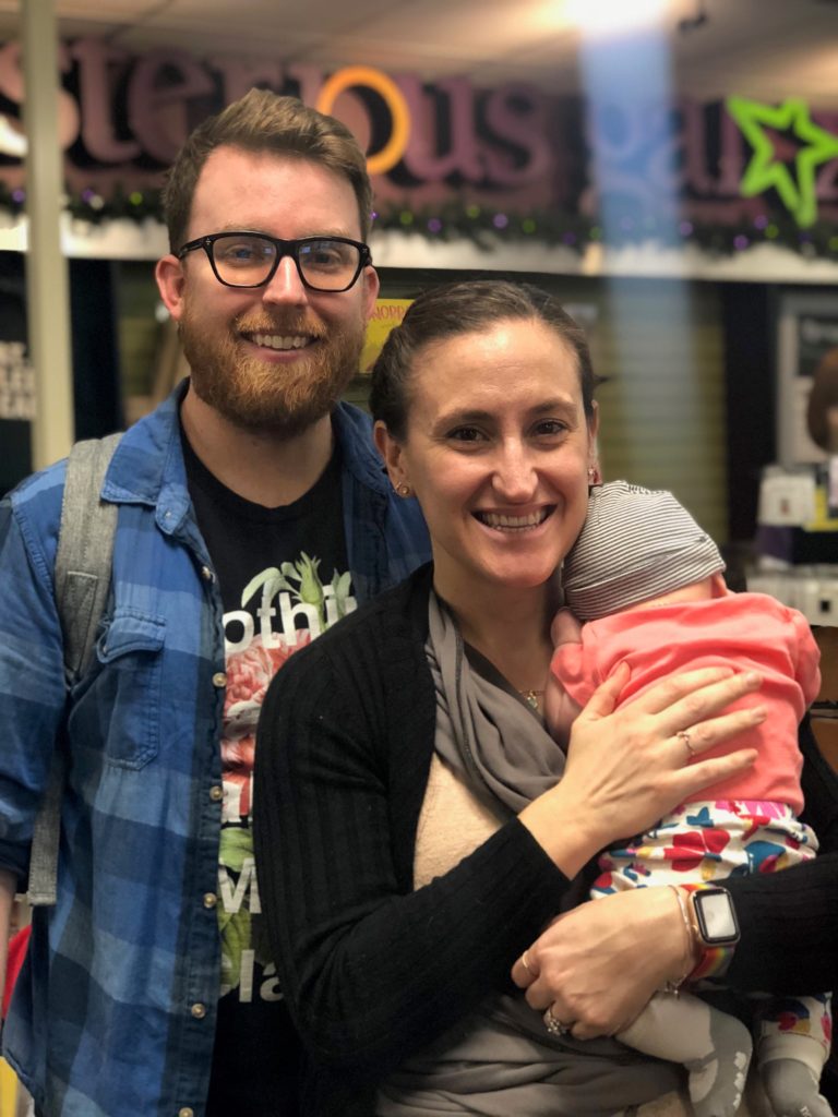 Terry Gilman and Jennifer Marchisotto will become the new owners of Mysterious Galaxy bookstore in January. Baby Amelia has her back to the camera.
