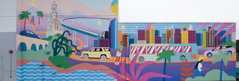 The building features a mural by Ocean Beach artist Celeste Byers that colorfully illustrates vehicles and scooters in what Byers describes as her 'interpretation of Lyft’s future of travel … throughout some of the City’s most iconic landmarks.'