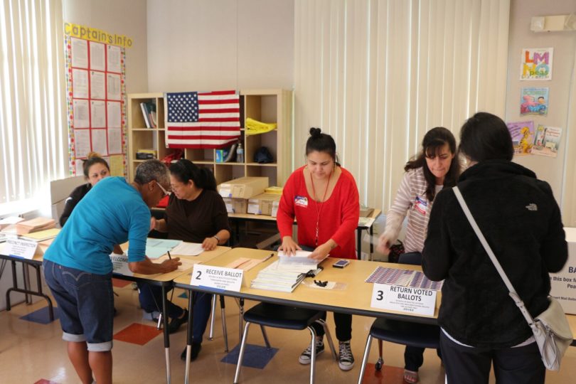 Poll workers in San Diego.