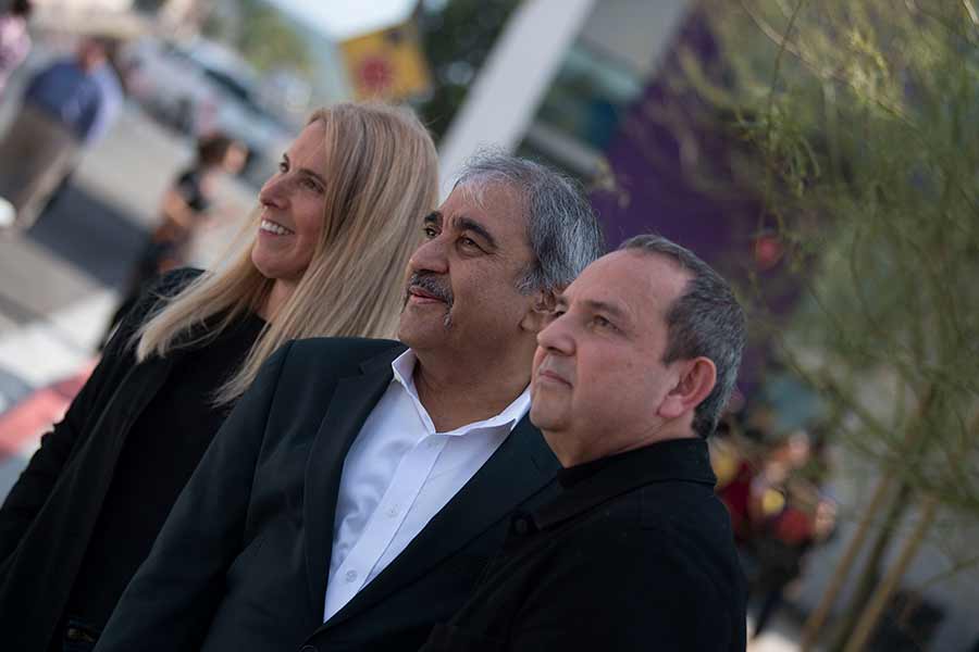 Fonna Forman and Teddy Cruz, co-directors of the UC San Diego Community Stations initiative, with Chancellor Pradeep Khosla in the middle. (Photo by Erik Jepsen/UC San Diego Publications)