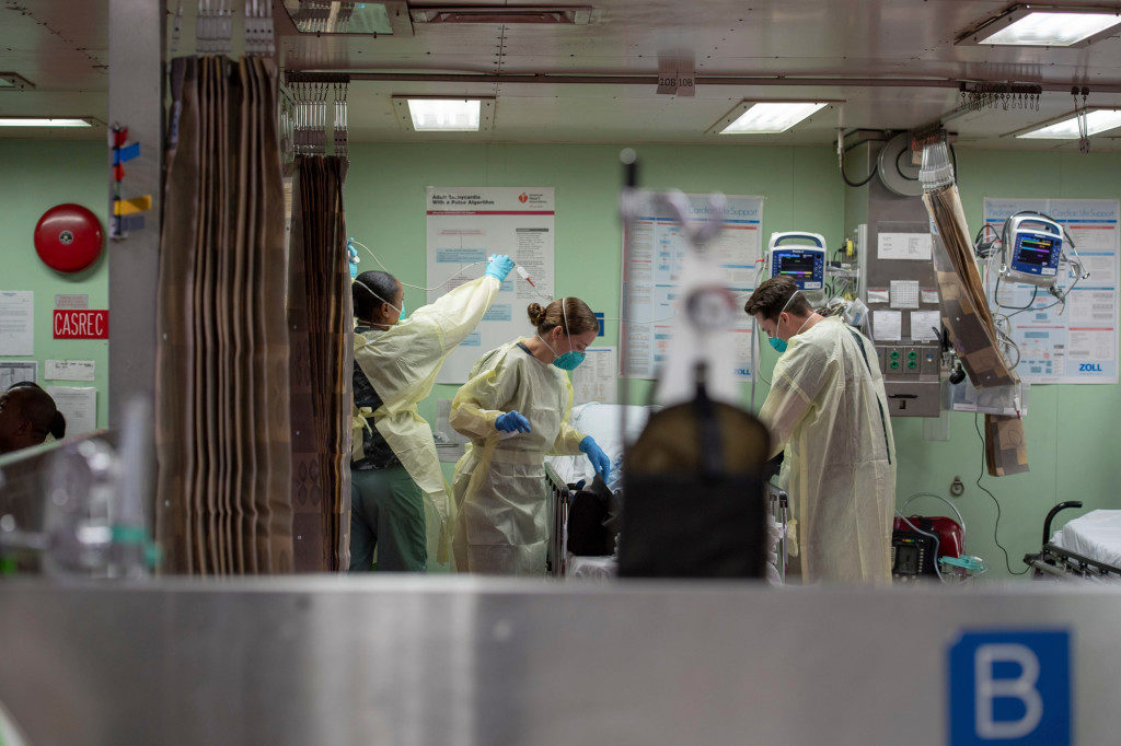 Sailors assigned to the hospital ship USNS Mercy admit a patient in Los Angeles. (Photo by Erwin Jacob Miciano, U.S. Navy)