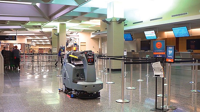 A Brain Corp floor scrubber roams San Diego International Airport autonomously. (Photo courtesy of Brain Corp)