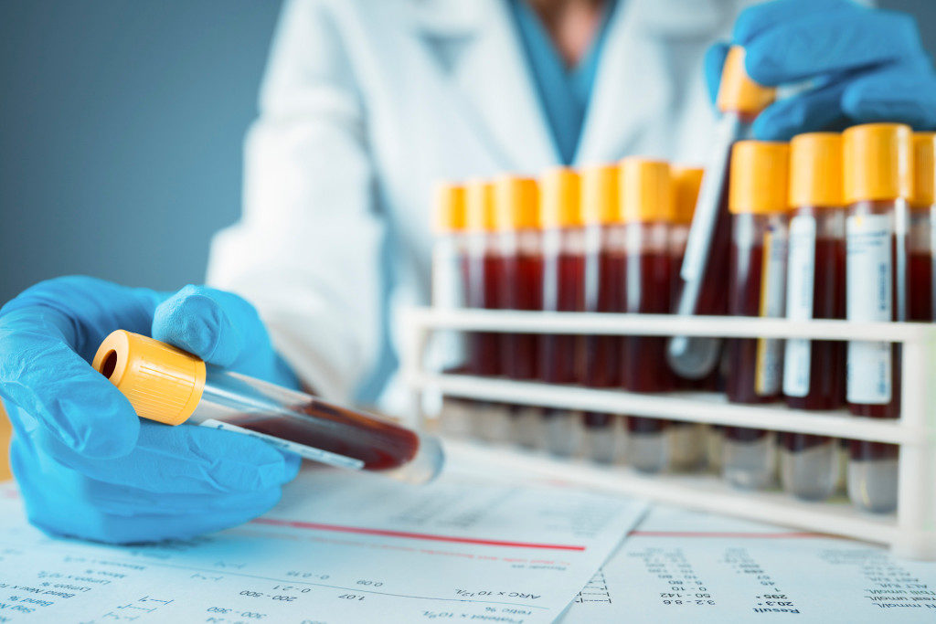 Researchers are trying to develop a blood test that would indicate who has immunity to COVID-19. (Image via iStock)