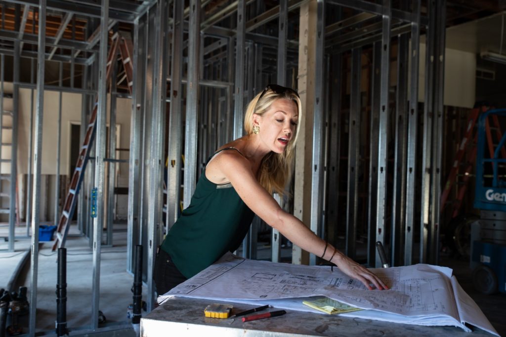 Jessica Waite, pictured when The Plot was under construction last fall, opened the restaurant in January. It's her third eatery in Oceanside. (Photo by Christine Vaughan)