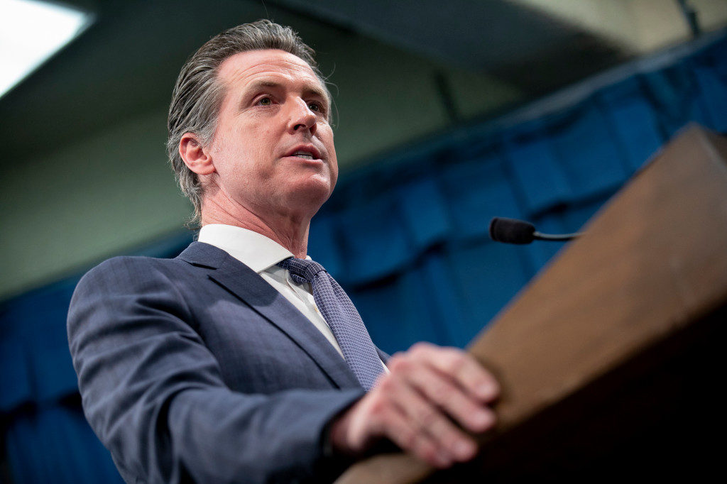 Gov. Gavin Newsom holds a press conference in the wake of the first COVID-19 deaths in California. (Photo by Anne Wernikoff for CalMatters)