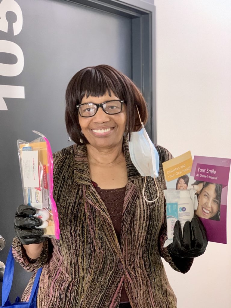 Irma Thompson, 70, who suffers from diabetes, high blood pressure and other ailments, has received an oral hygiene kit. (Photo courtesy of the Gary & Mary West Senior Dental Center)