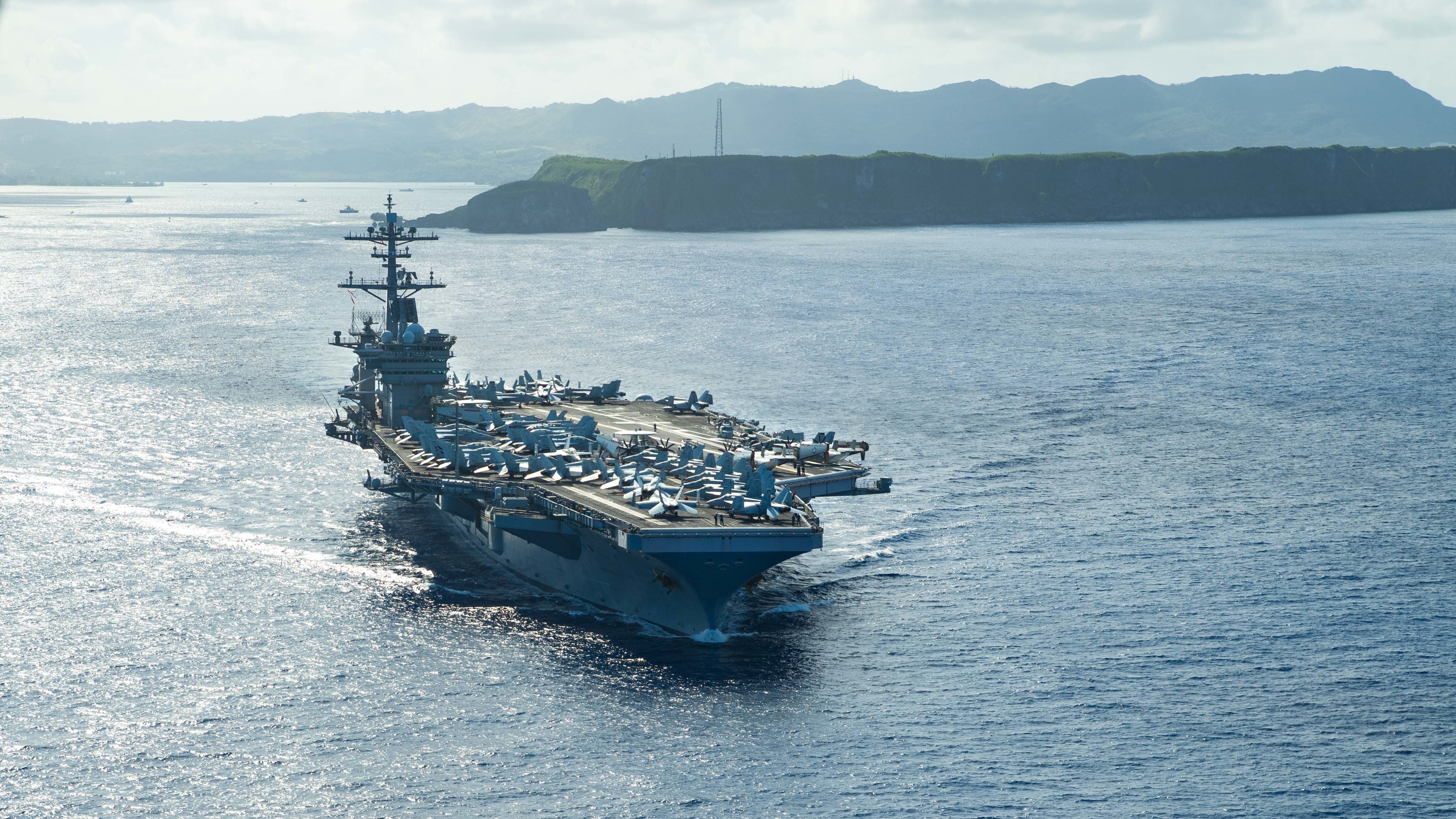 The USS Theodore Roosevelt operates in the Philippine Sea on Thursday following an extended visit to Guam in the midst of the COVID-19 global pandemic. (U.S. Navy photo by Mass Communication Specialist Seaman Kaylianna Genier)