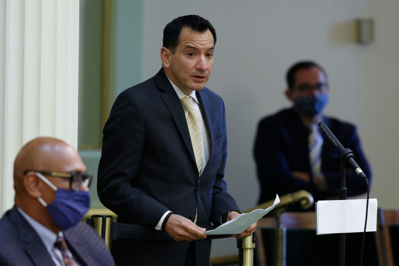 Assembly Speaker Anthony Rendon, D-Lakewood, urges lawmakers to approve the state budget bill, at the Capitol in Sacramento, Calif., Monday, June 15, 2020. The Assembly approved the spending plan and sent it to the Senate, but it will likely change as negotiations continue with Gov. Gavin Newsom on how to cover a $54.3 billion deficit. (AP Photo/Rich Pedroncelli)
