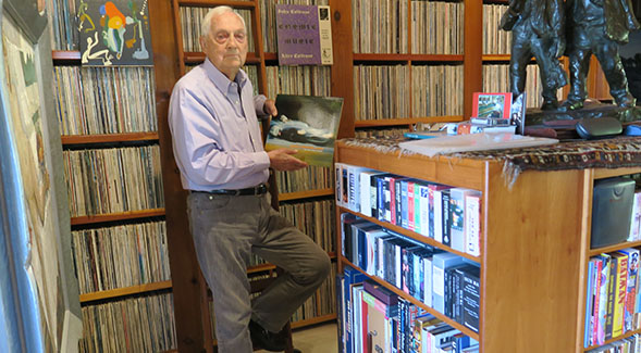 Bram Dijkstra holds one of the vinyl record sleeves from the archive. (Photo courtesy of Bram and Sandra Dijkstra)