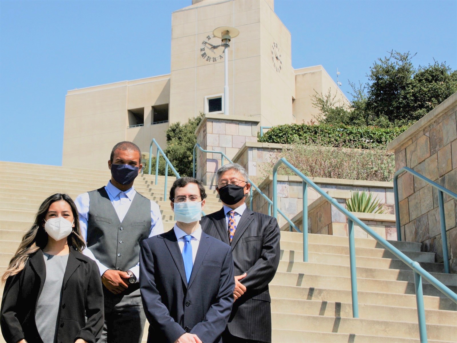 Recent alumni, from left: Margie Tumolva, James Bennett and Chace Bower, with guidance from professor William Byun (far right), developed a Senior Experience project into a company, Scylla Microgrid. (Photo: Cal State San Marcos)