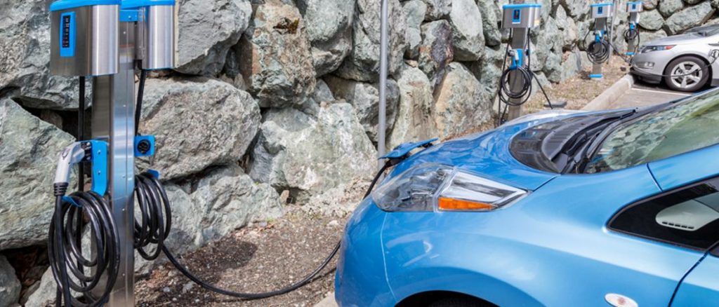 A row of electric vehicle chargers.