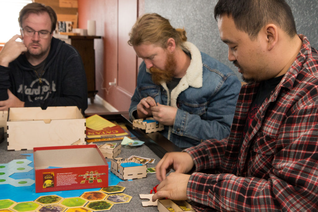 Greg Spence, left, with employees Jeremy Royer and Tuan Vo