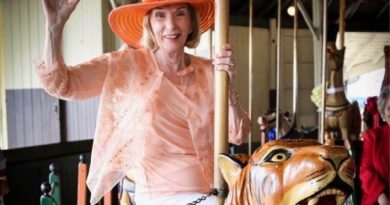 Dorothea Laub on her adopted Balboa Park Carousel ride.